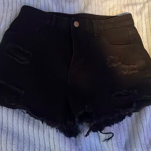 black jean shorts.